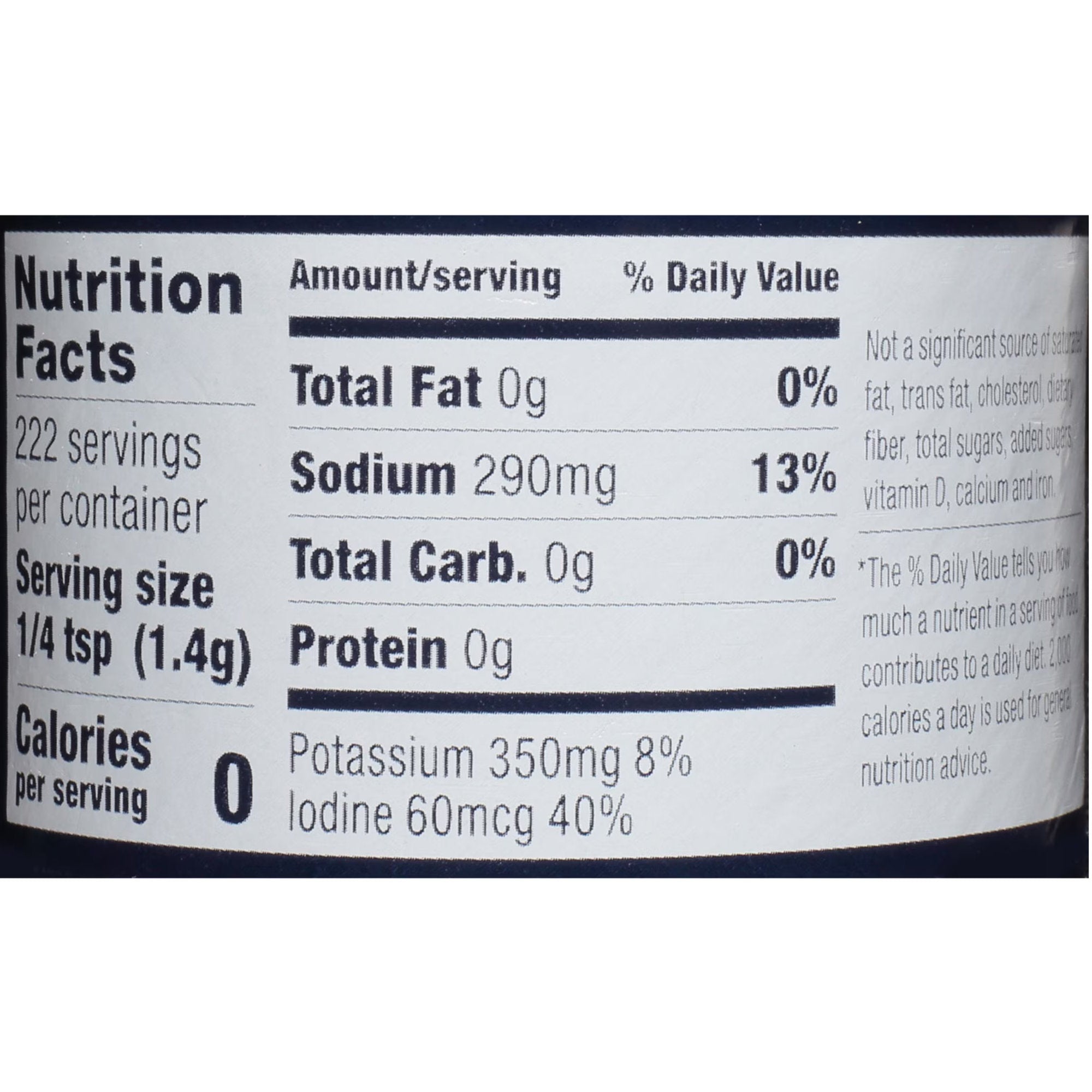 A close-up of a nutrition facts label showing serving size, calories, and nutrient content including total fat, sodium, total carbohydrate, and protein per serving.
